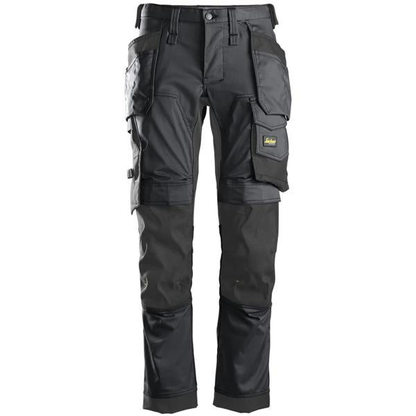 Black work pants with multiple pockets and attachments on a white background