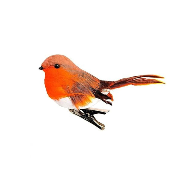 Artificial robin bird on a clothespin against a white background