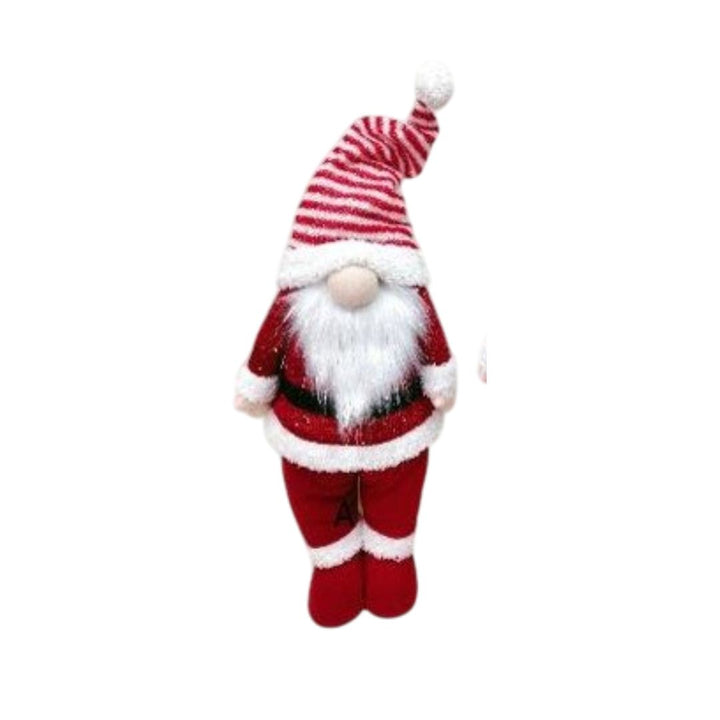 Red and white striped gnome figurine on a white background