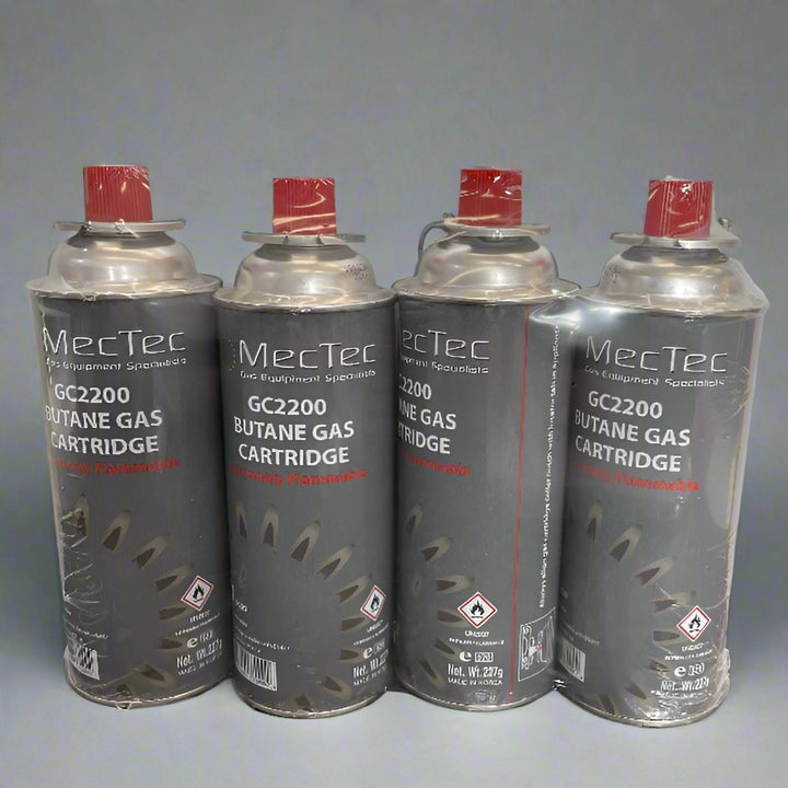 Butane Gas Cartridge Pack of 4 on a grey background